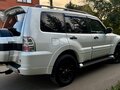 2019 Mitsubishi Pajero IV Рестайлинг 2, белый - вид 7