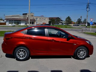 2011 Hyundai Solaris I, красный, 710000 рублей, вид 4