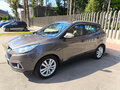 2012 Hyundai ix35 I, коричневый - вид 1