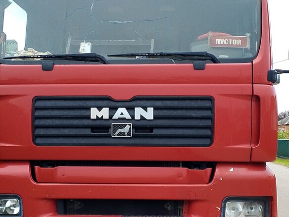2003 MAN TGA, красный, 1450000 рублей - вид 5