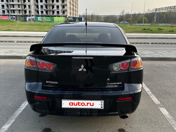 2010 Mitsubishi Lancer X, чёрный, 720000 рублей - вид 7