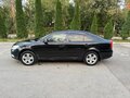 2011 Skoda Octavia DSG7 II (A5) Рестайлинг, чёрный - вид 3
