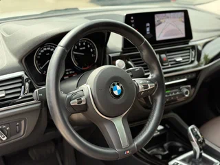 2022 BMW 1 серии 120i III (F52) Рестайлинг, белый, 2090000 рублей, вид 4