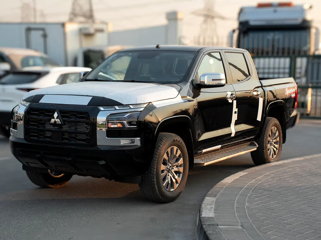 Открыть фотографии: Mitsubishi L200 VI