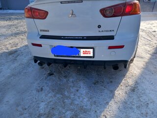 2008 Mitsubishi Lancer X, белый, 750000 рублей, вид 2
