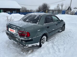 2003 Mitsubishi Carisma I Рестайлинг, зелёный, 210000 рублей, вид 3
