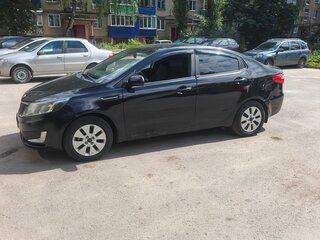 2013 Kia Rio 5-speed III, чёрный, 460000 рублей, вид 1