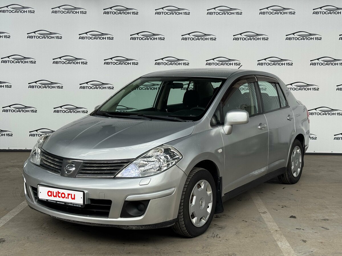 Открыть фотографии: Nissan Tiida I
