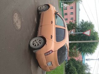 2003 Nissan March III (K12), оранжевый, 320000 рублей, вид 1