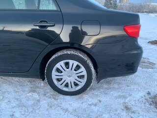 2010 Toyota Corolla X (E140, E150) Рестайлинг, чёрный, 1170000 рублей, вид 2