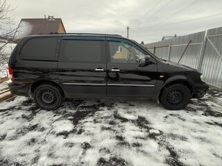 2005 Kia Carnival I Рестайлинг, чёрный, 800000 рублей, вид 4