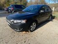2008 Mitsubishi Lancer X, чёрный, 460000 рублей - вид 1
