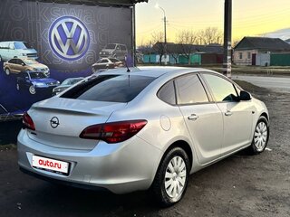 2014 Opel Astra J Рестайлинг, серебристый, 765000 рублей, вид 4
