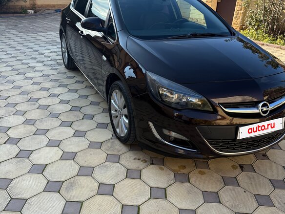 2014 Opel Astra J Рестайлинг, коричневый, 870000 рублей - вид 1