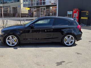 2009 BMW 1 серии 116i I (E81/E82/E87/E88) Рестайлинг, чёрный, 1650000 рублей, вид 1