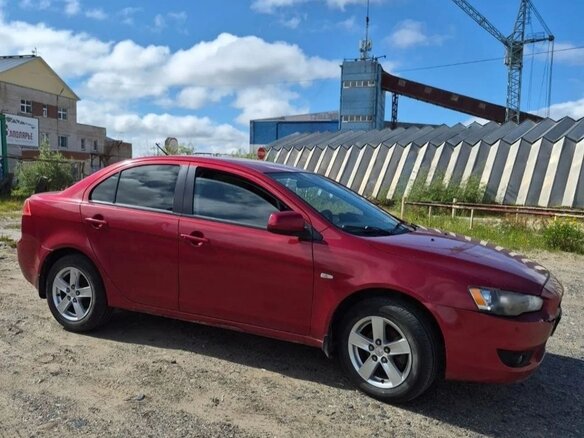2008 Mitsubishi Lancer X, красный, 650000 рублей - вид 7