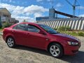 2008 Mitsubishi Lancer X, красный, 650000 рублей - вид 7