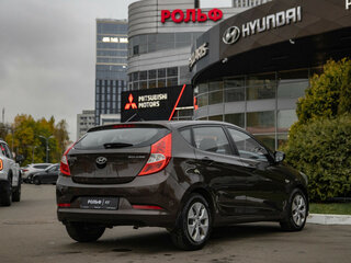 2015 Hyundai Solaris I Рестайлинг, коричневый, 858000 рублей, вид 4