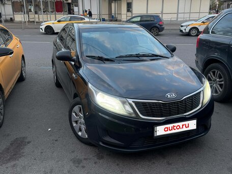 2012 Kia Rio III, чёрный, вид 2