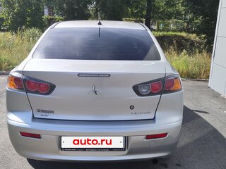 2013 Mitsubishi Lancer X Рестайлинг, серебристый, 900000 рублей, вид 2