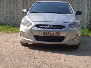 2011 Hyundai Solaris I, серебристый, 650000 рублей, вид 3