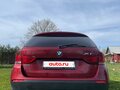 2012 BMW X1 20i I (E84), пурпурный, 1100000 рублей - вид 1
