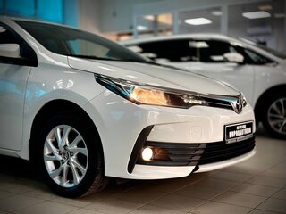 2018 Toyota Corolla XI (E160, E170, E180) Рестайлинг 1, белый, 1899000 рублей, вид 5