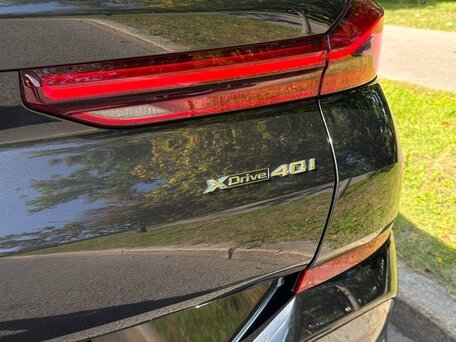 2021 BMW X6 40i III (G06), чёрный, 8190000 рублей, вид 4