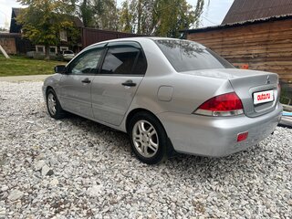 2006 Mitsubishi Lancer IX Рестайлинг, серебристый, 348000 рублей, вид 3