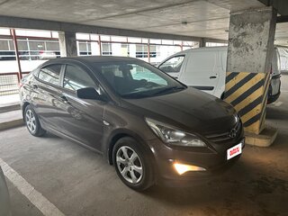 2015 Hyundai Solaris I Рестайлинг, коричневый, 790000 рублей, вид 3