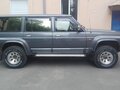 1993 Nissan Patrol IV (Y60), серый - вид 1