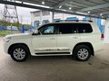 2015 Toyota Land Cruiser 200 Series Рестайлинг 2, белый - вид 1