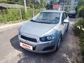 2012 Chevrolet Aveo II, серебристый, 570000 рублей - вид 2