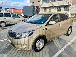 2013 Kia Rio 4-speed III, бежевый, 820000 рублей, вид 1