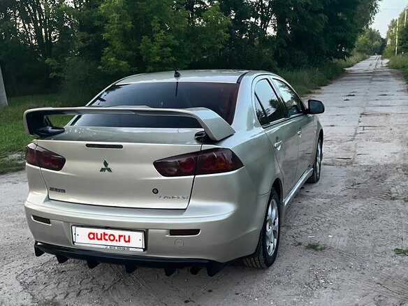 2007 Mitsubishi Lancer X, бежевый, 720000 рублей - вид 6
