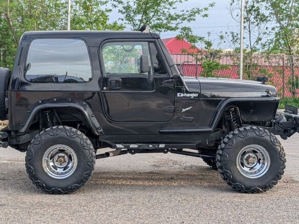 1993 Jeep Wrangler I (YJ), чёрный, 2000000 рублей - вид 4