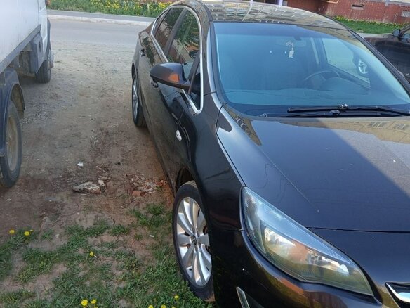 2013 Opel Astra J Рестайлинг, коричневый, 670000 рублей - вид 7