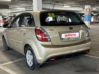 2010 Kia Rio II Рестайлинг, золотистый, 595000 рублей, вид 5