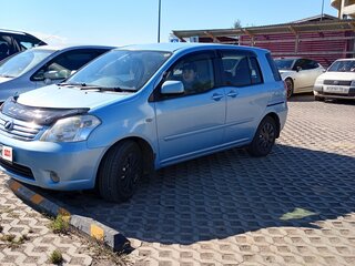 2009 Toyota Raum II, голубой, 700000 рублей, вид 4