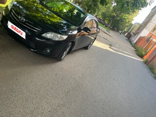2010 Toyota Corolla X (E140, E150) Рестайлинг, чёрный, 680000 рублей, вид 3
