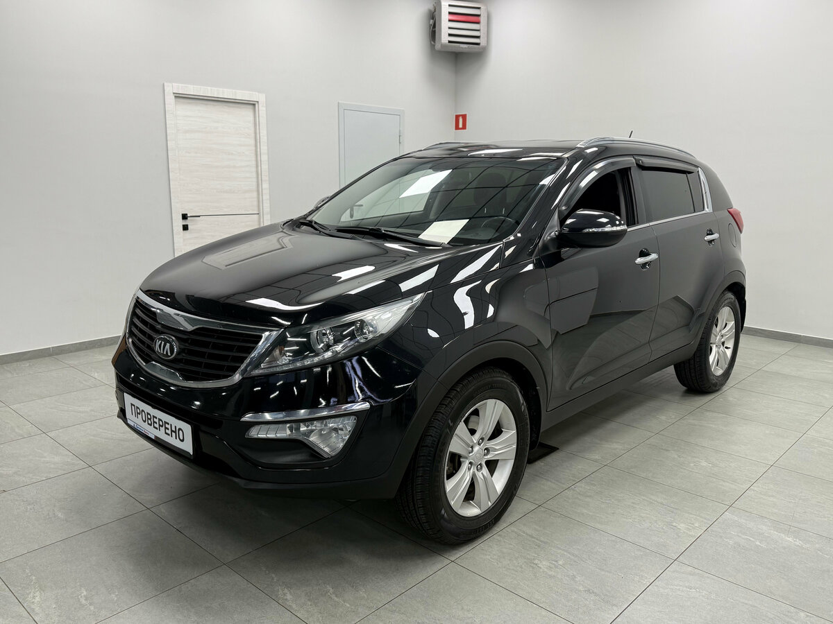 Открыть фотографии: Kia Sportage III
