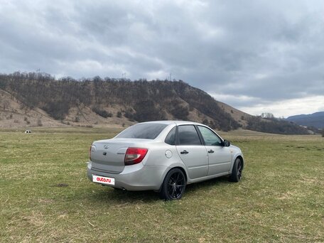 2013 Lada (ВАЗ) Granta I, серебристый, вид 4