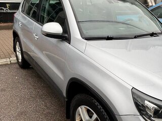 2015 Volkswagen Tiguan I Рестайлинг, серебристый, 1400000 рублей, вид 4