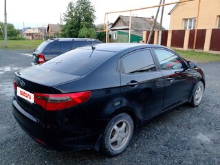 2013 Kia Rio III, чёрный, 745000 рублей, вид 2