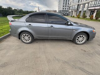 2012 Mitsubishi Lancer X Рестайлинг, серебристый, 930000 рублей, вид 3