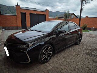 2019 Toyota Corolla XII (E210), чёрный, 1400000 рублей, вид 2