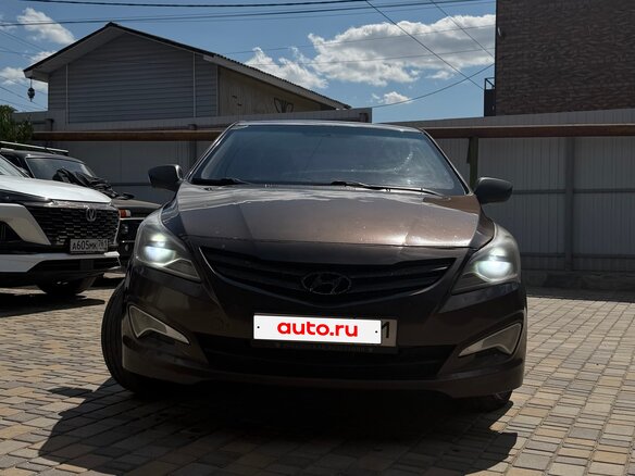 2014 Hyundai Solaris I Рестайлинг, коричневый, 849000 рублей