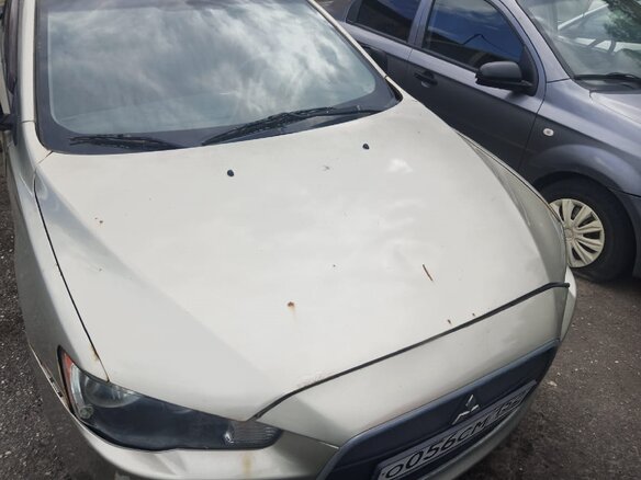 2010 Mitsubishi Lancer X, бежевый, 268000 рублей - вид 1