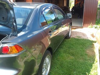 2011 Mitsubishi Lancer X Рестайлинг, серый, 720000 рублей, вид 5