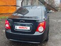 2013 Chevrolet Aveo II, чёрный, 650000 рублей - вид 2